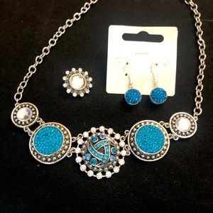 Necklace and matching earrings. Turquoise colored stones. 20”.